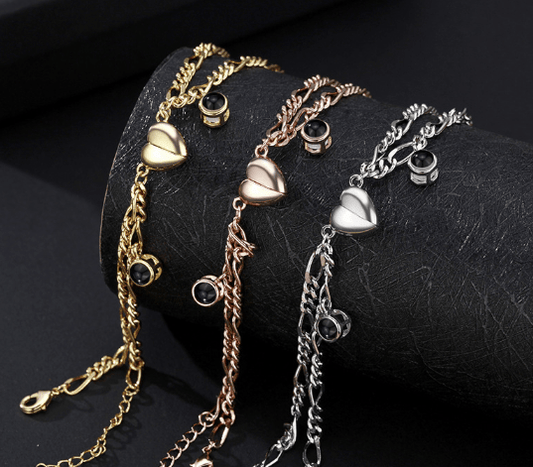 "Couple Bracelet with Simple Projection in 100 Languages" - Dakdouksson